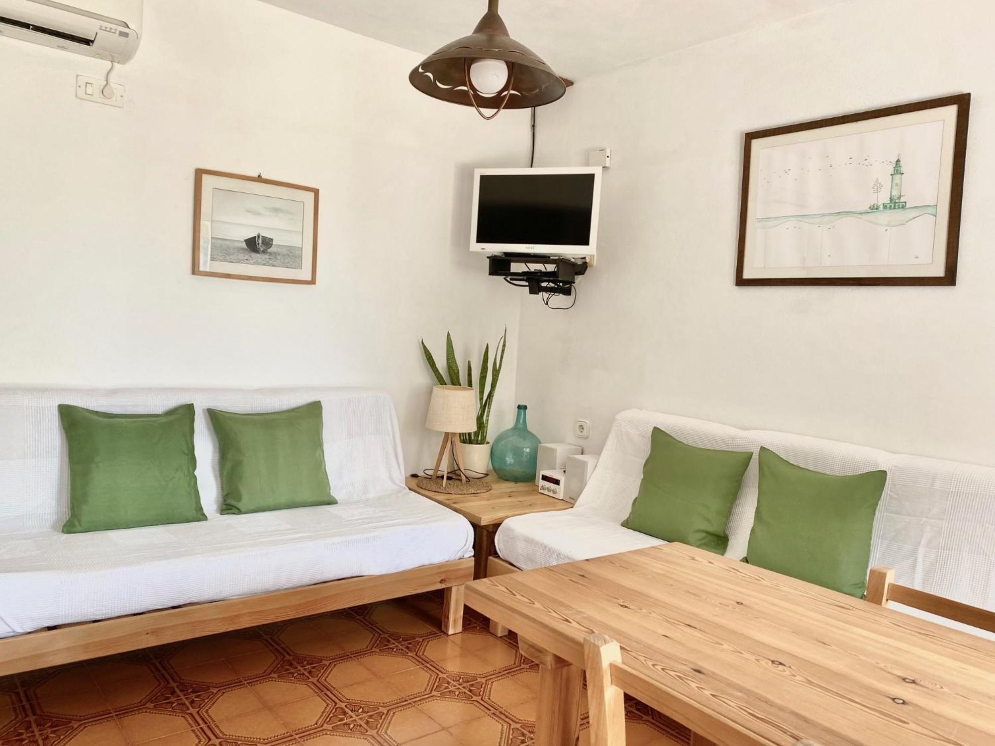Apartamentos Laura Playa De Migjorn Eksteriør billede